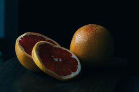 citrus fruit on black background