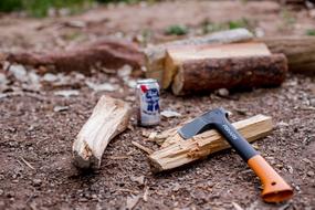 Axe over Firewood on ground