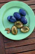 sweet plums on plate
