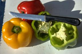 sharp knife on peppers