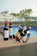 wine bottles by pool