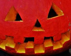 funny carved face on pumpkin