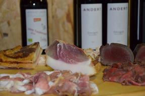 Pieces of lard near the bottle