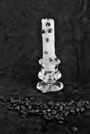white candle with coffee beans