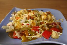Rice with vegetables in plate