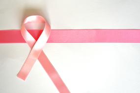 pink ribbon as symbol of breast cancer awareness
