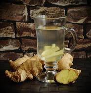 drink with fresh ginger on the table