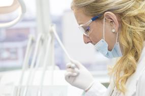 photo of doctor in glasses and medical mask