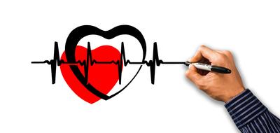 Black, white and red drawing of heart with pulse
