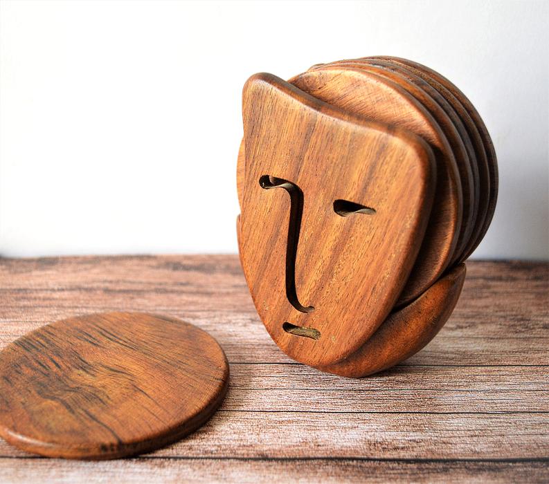male face, rustic wood carving