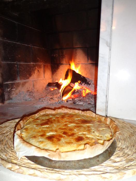 baked food near fireplace