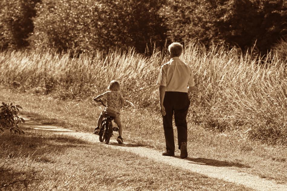 Man and Child on the path in monochrome