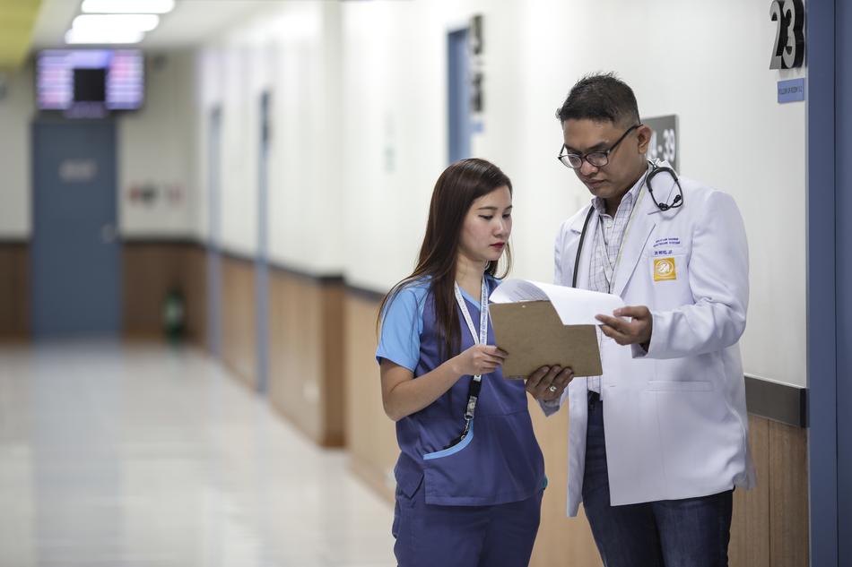 doctor with assistant at work
