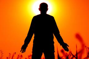 male Silhouette at Blur Red background