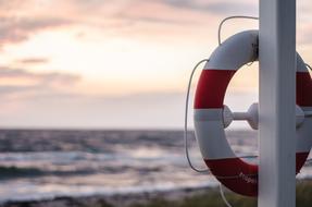 red white Life Saving ring at sea