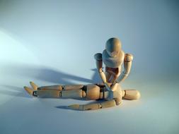 First Aid, massage of heart, wooden dolls