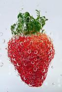 Strawberry underwater close up