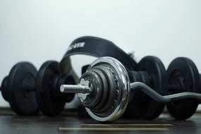 black dumbbells for training in the gym