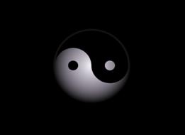 yin yang on the black background