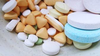 tablets of different types and shapes on the table