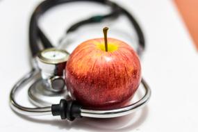 red Apple at stethoscope
