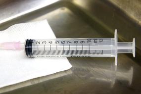 empty Syringe on paper