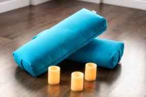 Yoga Bolster and Candle