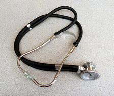 photo of a stethoscope on a white table