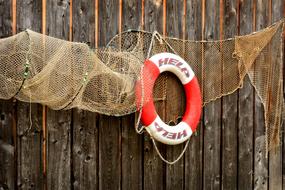 fishing net on the wooden wall