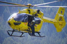 yellow helicopter of a civil protection