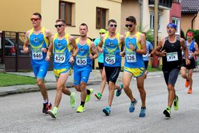 young men Run rajec Marathon on street, slovakia