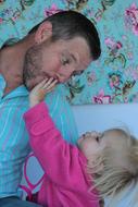 girl play with dad