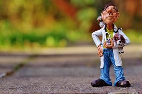 Veterinarian with Animals clay