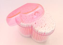 cotton buds in a transparent box