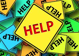 "help" as a bunch of colorful signs