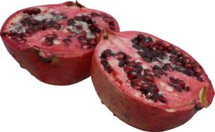 two halves of beautiful dark red pomegranate at white background