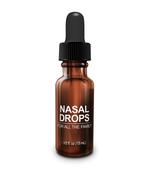 nasal drops in brown bottle at white background