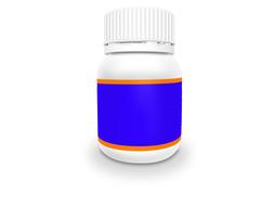 vitamin pills in a white plastic jar