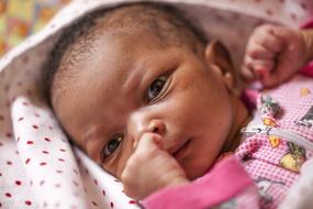 cute dark skin Baby girl, face portrait