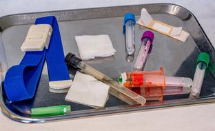 blood collection tubes on a metal tray
