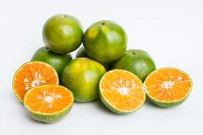 orange fruit with green peel