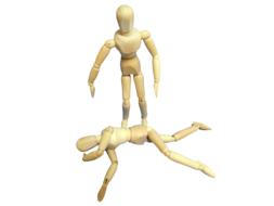 wooden figurines of people during first aid