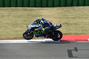 Valentino Rossi on a racing bike on the track