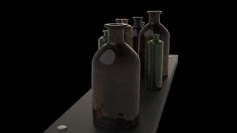 vintage bottles made of old glass at dark background