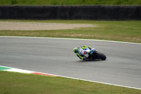 Valentino Rossi on a motorcycle at races