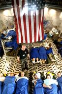 hurricane katrina victims in Plane, evacuation