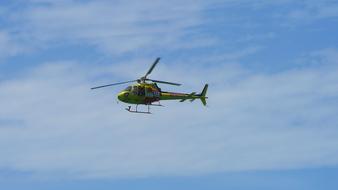 rescue medical helicopter high up in the sky