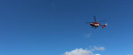Helicopter on Sky Clouds