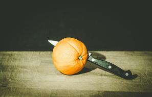 Orange Citrus Fruit and knife