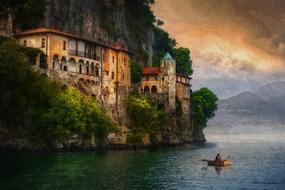 ancient architecture on a sheer cliff in italy